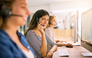 Female wearing headphones smiling